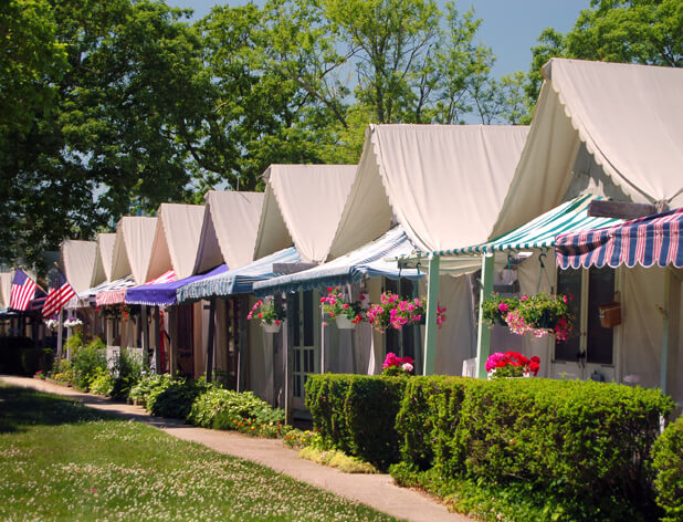 Colorful awnings and flowers decorate tent houses in Ocean Grove